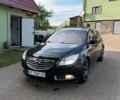 Чорний Опель Інсігнія, об'ємом двигуна 1.96 л та пробігом 290 тис. км за 7250 $, фото 1 на Automoto.ua
