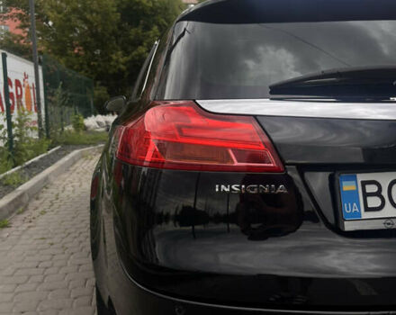 Черный Опель Инсигния, объемом двигателя 1.96 л и пробегом 300 тыс. км за 10400 $, фото 15 на Automoto.ua