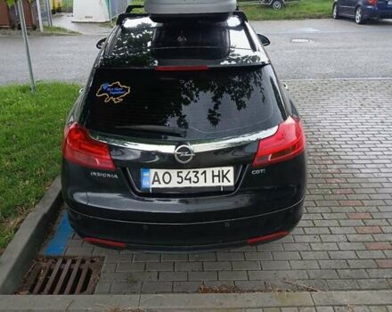 Черный Опель Инсигния, объемом двигателя 2 л и пробегом 258 тыс. км за 7000 $, фото 3 на Automoto.ua