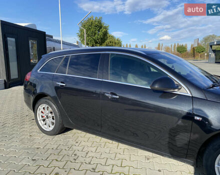 Черный Опель Инсигния, объемом двигателя 2 л и пробегом 288 тыс. км за 7600 $, фото 1 на Automoto.ua