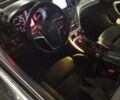 Черный Опель Инсигния, объемом двигателя 2 л и пробегом 265 тыс. км за 10500 $, фото 2 на Automoto.ua