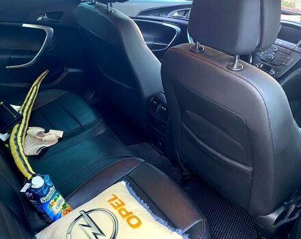 Черный Опель Инсигния, объемом двигателя 2 л и пробегом 200 тыс. км за 9500 $, фото 3 на Automoto.ua