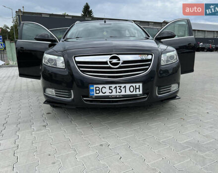 Черный Опель Инсигния, объемом двигателя 1.96 л и пробегом 230 тыс. км за 8500 $, фото 6 на Automoto.ua