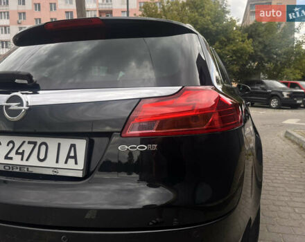 Черный Опель Инсигния, объемом двигателя 1.96 л и пробегом 300 тыс. км за 10400 $, фото 14 на Automoto.ua