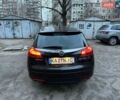 Черный Опель Инсигния, объемом двигателя 2 л и пробегом 165 тыс. км за 9200 $, фото 4 на Automoto.ua