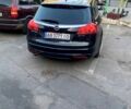 Черный Опель Инсигния, объемом двигателя 2 л и пробегом 200 тыс. км за 9500 $, фото 2 на Automoto.ua