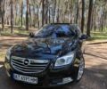Чорний Опель Інсігнія, об'ємом двигуна 2 л та пробігом 190 тис. км за 9000 $, фото 3 на Automoto.ua