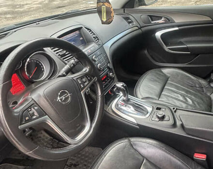Черный Опель Инсигния, объемом двигателя 1.96 л и пробегом 333 тыс. км за 9950 $, фото 5 на Automoto.ua