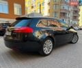 Чорний Опель Інсігнія, об'ємом двигуна 1.96 л та пробігом 300 тис. км за 6850 $, фото 14 на Automoto.ua