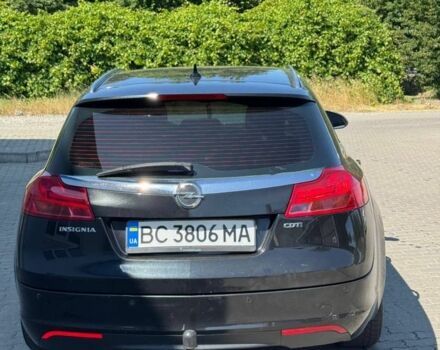 Чорний Опель Інсігнія, об'ємом двигуна 2 л та пробігом 320 тис. км за 6900 $, фото 4 на Automoto.ua
