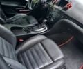 Чорний Опель Інсігнія, об'ємом двигуна 1.96 л та пробігом 233 тис. км за 6500 $, фото 12 на Automoto.ua
