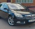 Черный Опель Инсигния, объемом двигателя 1.96 л и пробегом 230 тыс. км за 7500 $, фото 1 на Automoto.ua