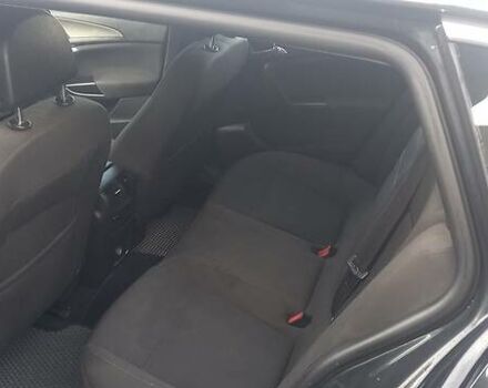 Черный Опель Инсигния, объемом двигателя 2 л и пробегом 400 тыс. км за 7500 $, фото 4 на Automoto.ua