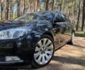Чорний Опель Інсігнія, об'ємом двигуна 2 л та пробігом 190 тис. км за 9000 $, фото 1 на Automoto.ua