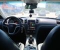 Чорний Опель Інсігнія, об'ємом двигуна 1.96 л та пробігом 278 тис. км за 6700 $, фото 5 на Automoto.ua