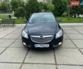 Черный Опель Инсигния, объемом двигателя 2 л и пробегом 303 тыс. км за 7400 $, фото 1 на Automoto.ua