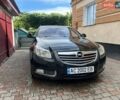 Чорний Опель Інсігнія, об'ємом двигуна 1.96 л та пробігом 312 тис. км за 6599 $, фото 1 на Automoto.ua