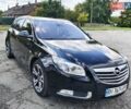Чорний Опель Інсігнія, об'ємом двигуна 1.96 л та пробігом 243 тис. км за 8300 $, фото 1 на Automoto.ua
