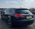 Чорний Опель Інсігнія, об'ємом двигуна 1.96 л та пробігом 275 тис. км за 6990 $, фото 5 на Automoto.ua