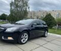 Чорний Опель Інсігнія, об'ємом двигуна 2 л та пробігом 303 тис. км за 7900 $, фото 1 на Automoto.ua