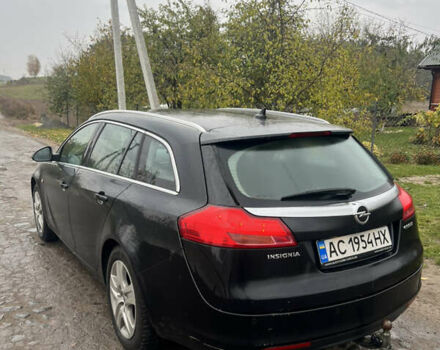 Чорний Опель Інсігнія, об'ємом двигуна 1.96 л та пробігом 215 тис. км за 7777 $, фото 1 на Automoto.ua