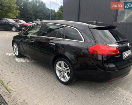 Черный Опель Инсигния, объемом двигателя 1.96 л и пробегом 300 тыс. км за 10400 $, фото 6 на Automoto.ua