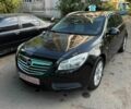 Чорний Опель Інсігнія, об'ємом двигуна 1.8 л та пробігом 195 тис. км за 7199 $, фото 1 на Automoto.ua