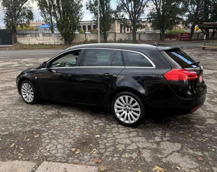 Черный Опель Инсигния, объемом двигателя 1.96 л и пробегом 333 тыс. км за 9950 $, фото 1 на Automoto.ua