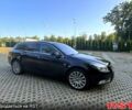 Черный Опель Инсигния, объемом двигателя 2 л и пробегом 220 тыс. км за 8450 $, фото 1 на Automoto.ua