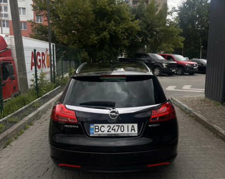 Черный Опель Инсигния, объемом двигателя 1.96 л и пробегом 300 тыс. км за 10400 $, фото 16 на Automoto.ua
