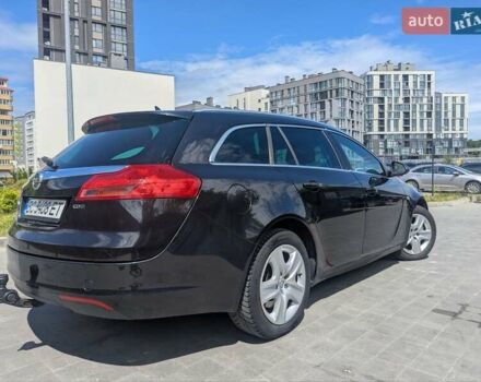 Черный Опель Инсигния, объемом двигателя 1.96 л и пробегом 339 тыс. км за 7700 $, фото 9 на Automoto.ua