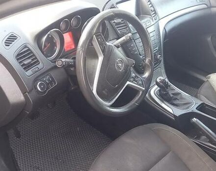 Черный Опель Инсигния, объемом двигателя 2 л и пробегом 400 тыс. км за 7500 $, фото 1 на Automoto.ua