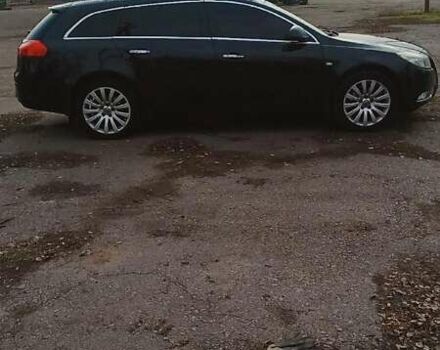 Черный Опель Инсигния, объемом двигателя 1.96 л и пробегом 298 тыс. км за 10000 $, фото 1 на Automoto.ua