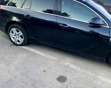 Черный Опель Инсигния, объемом двигателя 2 л и пробегом 200 тыс. км за 9500 $, фото 1 на Automoto.ua