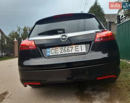 Чорний Опель Інсігнія, об'ємом двигуна 2 л та пробігом 214 тис. км за 12000 $, фото 4 на Automoto.ua