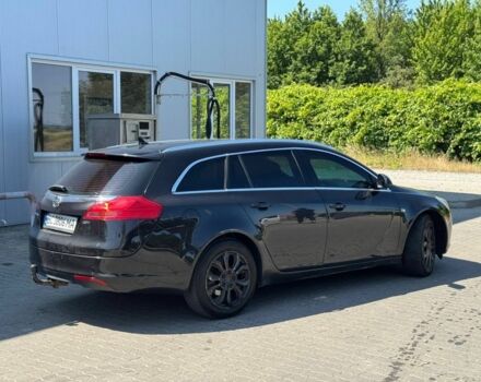 Чорний Опель Інсігнія, об'ємом двигуна 2 л та пробігом 320 тис. км за 6900 $, фото 2 на Automoto.ua