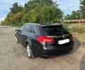 Черный Опель Инсигния, объемом двигателя 2 л и пробегом 170 тыс. км за 3406 $, фото 3 на Automoto.ua