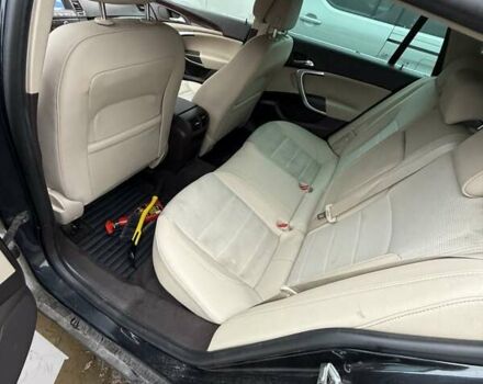 Черный Опель Инсигния, объемом двигателя 1.96 л и пробегом 263 тыс. км за 6500 $, фото 5 на Automoto.ua