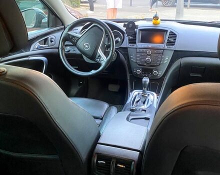 Черный Опель Инсигния, объемом двигателя 2 л и пробегом 200 тыс. км за 9500 $, фото 4 на Automoto.ua