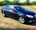 Черный Опель Инсигния, объемом двигателя 2 л и пробегом 300 тыс. км за 7200 $, фото 1 на Automoto.ua