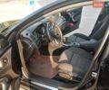 Черный Опель Инсигния, объемом двигателя 1.96 л и пробегом 303 тыс. км за 8693 $, фото 6 на Automoto.ua