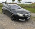 Чорний Опель Інсігнія, об'ємом двигуна 2 л та пробігом 275 тис. км за 8400 $, фото 1 на Automoto.ua