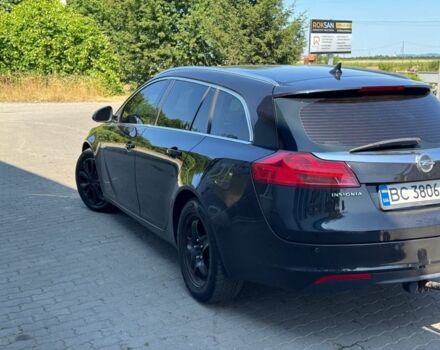 Чорний Опель Інсігнія, об'ємом двигуна 2 л та пробігом 320 тис. км за 6900 $, фото 3 на Automoto.ua