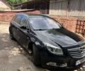 Черный Опель Инсигния, объемом двигателя 2 л и пробегом 280 тыс. км за 7500 $, фото 1 на Automoto.ua