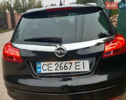 Чорний Опель Інсігнія, об'ємом двигуна 2 л та пробігом 214 тис. км за 12000 $, фото 1 на Automoto.ua