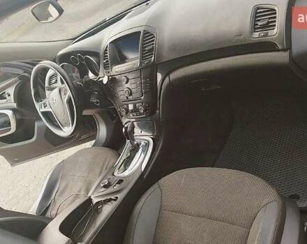 Черный Опель Инсигния, объемом двигателя 1.96 л и пробегом 298 тыс. км за 10000 $, фото 7 на Automoto.ua