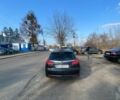 Чорний Опель Інсігнія, об'ємом двигуна 2 л та пробігом 350 тис. км за 7494 $, фото 2 на Automoto.ua