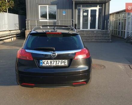 Черный Опель Инсигния, объемом двигателя 1.96 л и пробегом 315 тыс. км за 9000 $, фото 2 на Automoto.ua