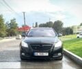 Черный Опель Инсигния, объемом двигателя 2 л и пробегом 248 тыс. км за 8500 $, фото 1 на Automoto.ua