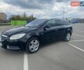 Черный Опель Инсигния, объемом двигателя 1.96 л и пробегом 323 тыс. км за 6500 $, фото 1 на Automoto.ua
